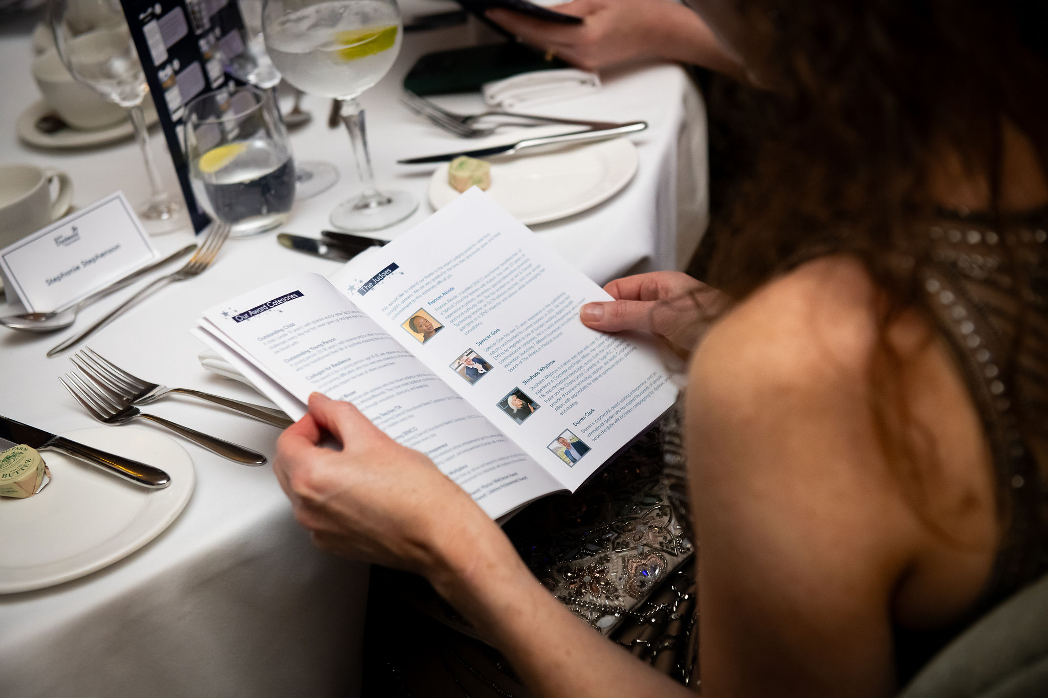 woman looking at brochure